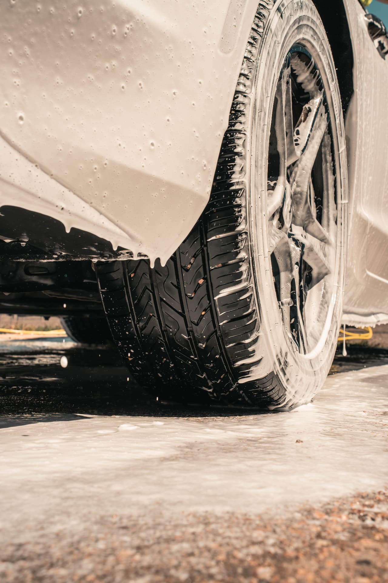 Foam-covered tire and wheel mid wash