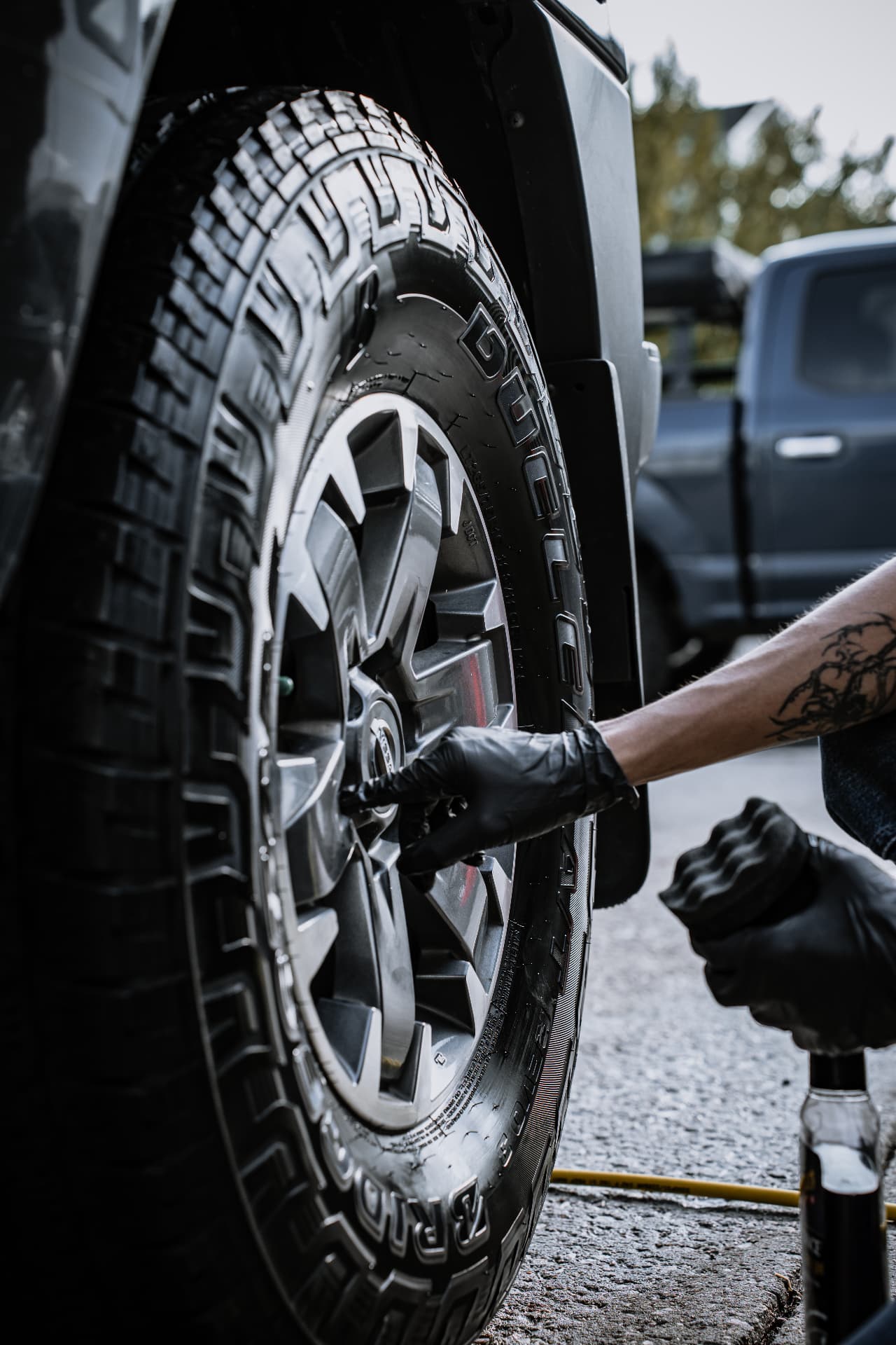 Applying tire dressing to an all-terrain tire